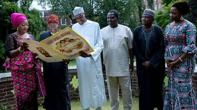 PHOTOS: Buhari laughs heartily as he hosts aides in London