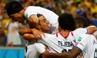 Compact Costa Rica defeat Greece on penalties