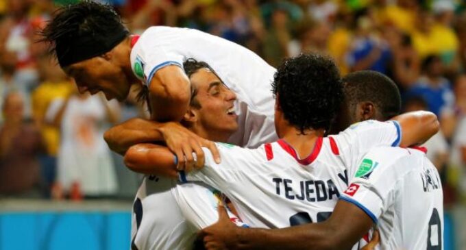 Compact Costa Rica defeat Greece on penalties