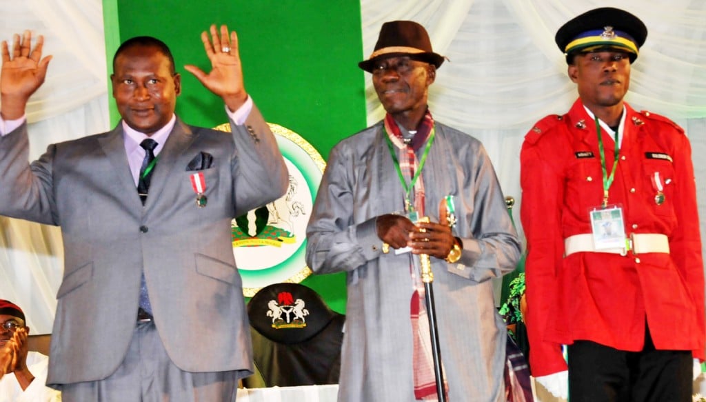 From left: 2013/2014 honours award winners, Mr Onuh Micheal (MON) , The head, presidential stewards, who has served under nine different heads of states/presidents; a taxi driver, Mr Imeh Usuah, who returned the sum of N18m (eighteen million naira) forgotten in his car by a customer and Mr Solomon Dauda (MON), a traffic warden,  for his acrobatic agility in controling traffic, at the Investiture in Abuja on Monday.