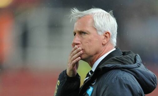 Alan Pardew, the sacked man warming the dugout