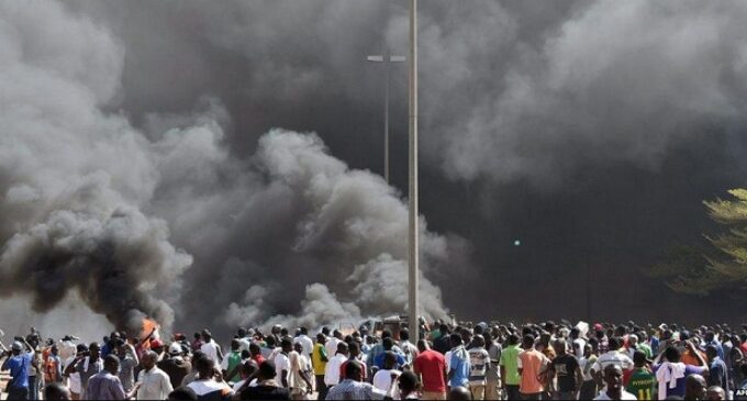 Protesters set Burkina Faso’s parliamentary building on fire