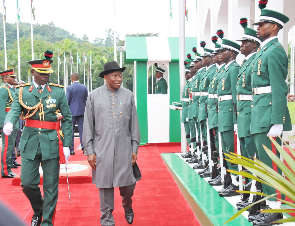 President Goodluck Jonathan Inspecting a Guard of Honour at the 54th Independence Presdidential change of Guards parade at the Presidential villa in Abuja on Wednesday, with him is the Commander, Presdiential Guards Brigade, Brig. Gen. Anthony Ommozoje