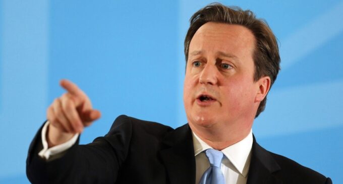 Man shoves British PM Cameron