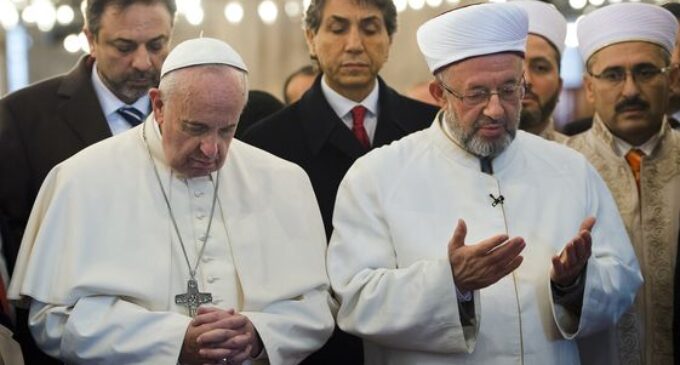 Pope Francis offers prayers in a mosque