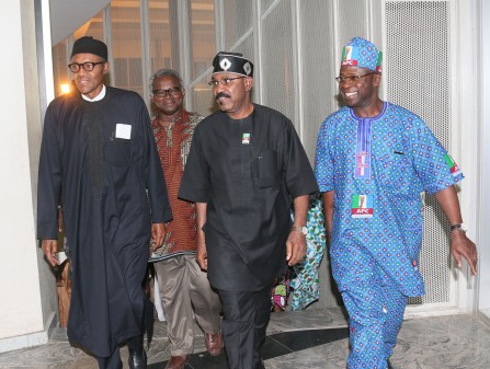 L-R; All Progress Congress Presidential Candidate, General Muhammadu Buhari welcomed by APC Chieftian Mr Osit Senator Olurunmibe Mamora, Mr Rotimi Fashiakin and others as General Buhari returned to Nigeria onboard British Airways flight 083 after weeks of working visit to the United Kingdom  t in Abuja.