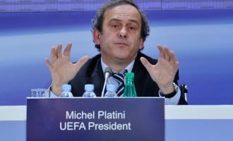 Re-elected Platini fears rise of hooliganism