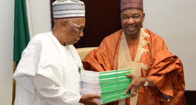 Sambo presents handover notes to Buhari’s men