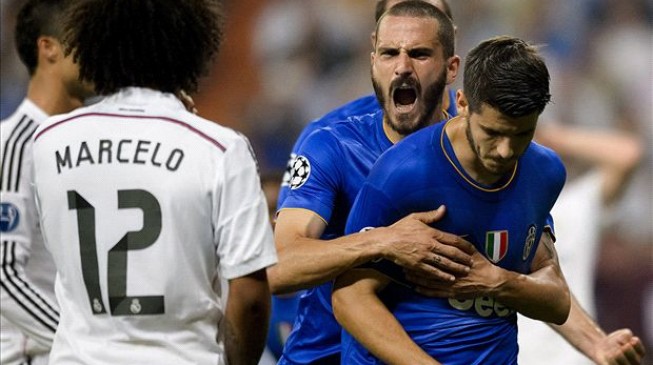 Morata’s goal eliminates ex-club Madrid from Champions League