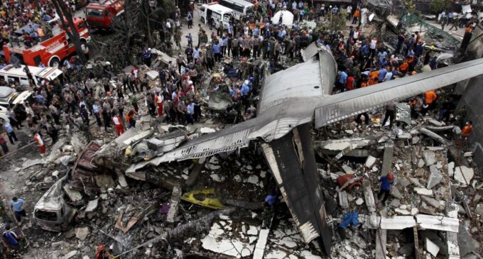 ‘140 killed’ as Indonesian plane crashes into residential area