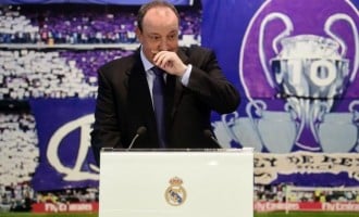 Emotional Benitez takes charge of Real