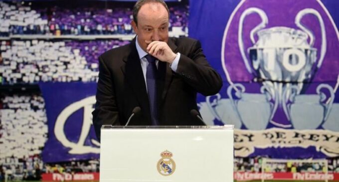 Emotional Benitez takes charge of Real