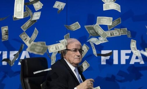 Comedian throws money over Blatter during FIFA congress