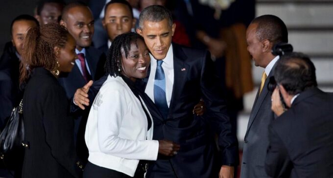 Obama received in Kenya by half-sister, Kenyatta