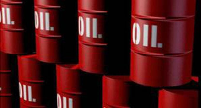 Oil price falls below $80 a barrel as central banks hike interest rates