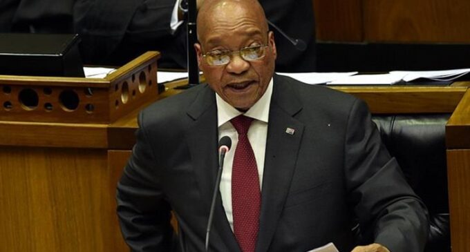 Zuma fires finance minister despite widespread opposition