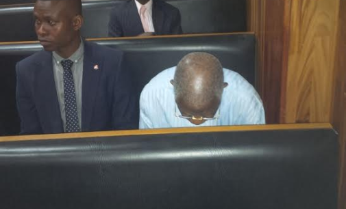EXTRA: Oronsaye hides from cameras in court