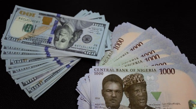 Naira stable as markets tremble over Trump’s Iran decision