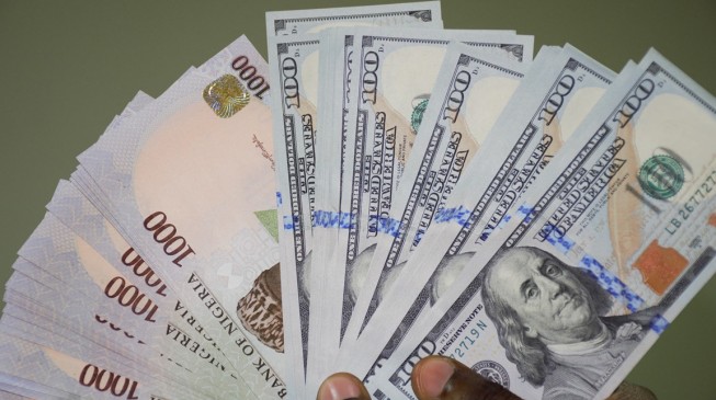 Naira steady, dollar slips while gold gains slightly
