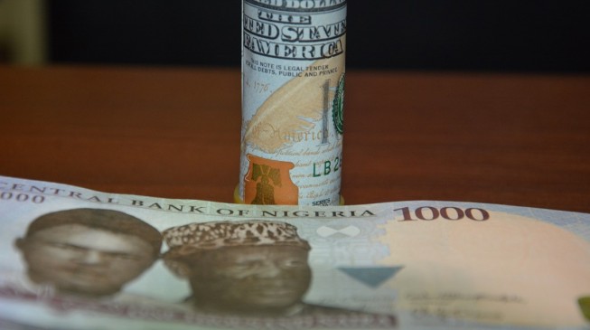 PwC says naira may fall to N386/$