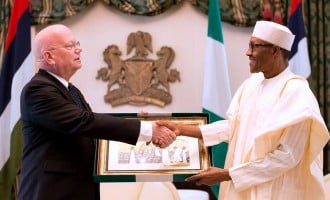 Buhari urges departing Entwistle to write a book on Nigeria