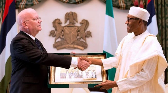 Buhari urges departing Entwistle to write a book on Nigeria
