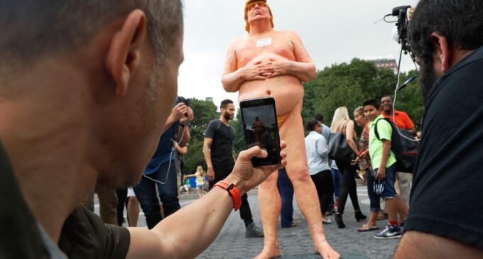 New Yorkers take selfie with naked statue of Donald Trump