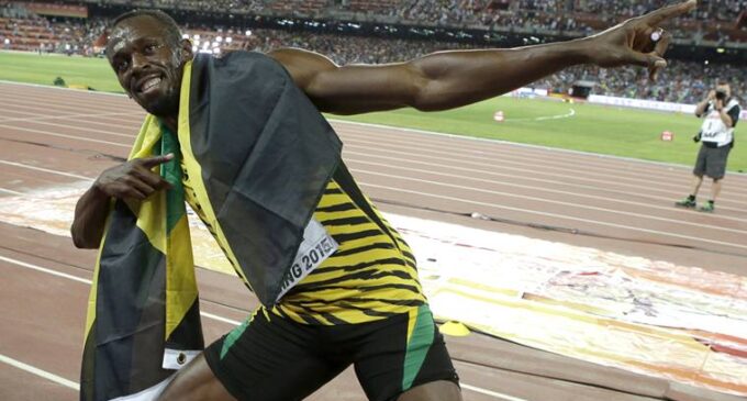 Usain Bolt storms to 100m Olympics treble win