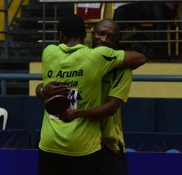 Quadri and Toriola share an embrace