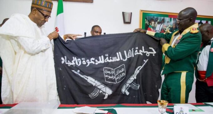 Buhari receives Boko Haram flag, silent on Shekau