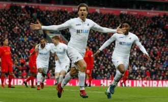 Swansea beat Liverpool for first ever league game win at Anfield