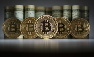 Global stocks under pressure; Bitcoin hits another record