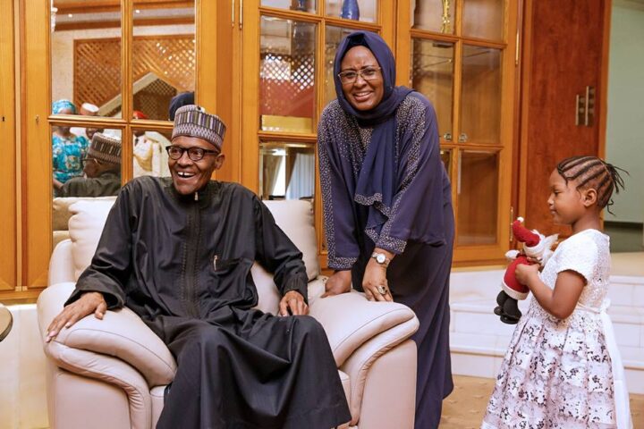 L-R: Then President Buhari, first lady, Aisha and one of his grand daughters | 2017 file photo
