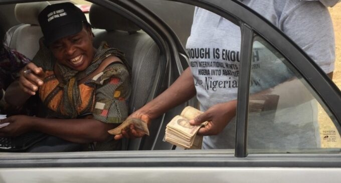 CAUGHT ON CAMERA: Anti-Amnesty protesters collecting money in Abuja