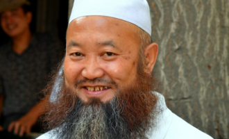 China bans long beards, veils in public places