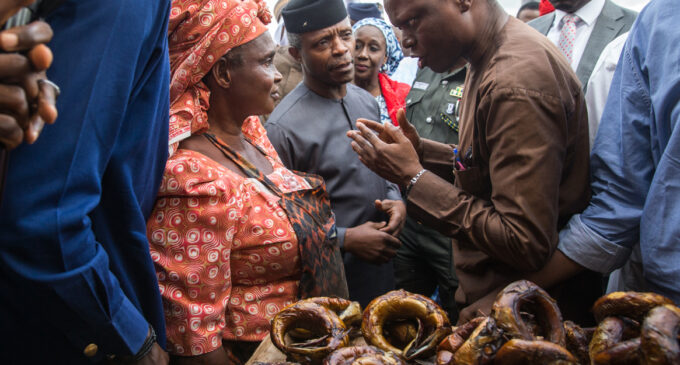 Osinbajo storms Abuja market, interacts with traders