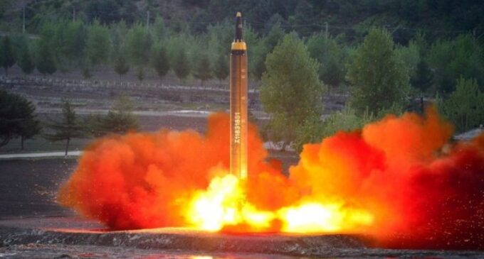 North Korea defies threats of sanctions, fires ballistic missile