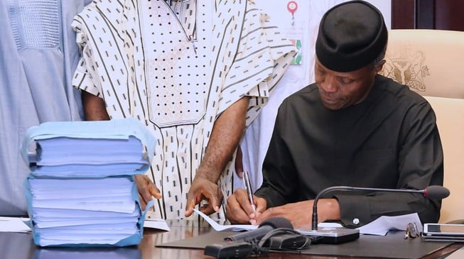 Finally, Osinbajo signs 2017 budget