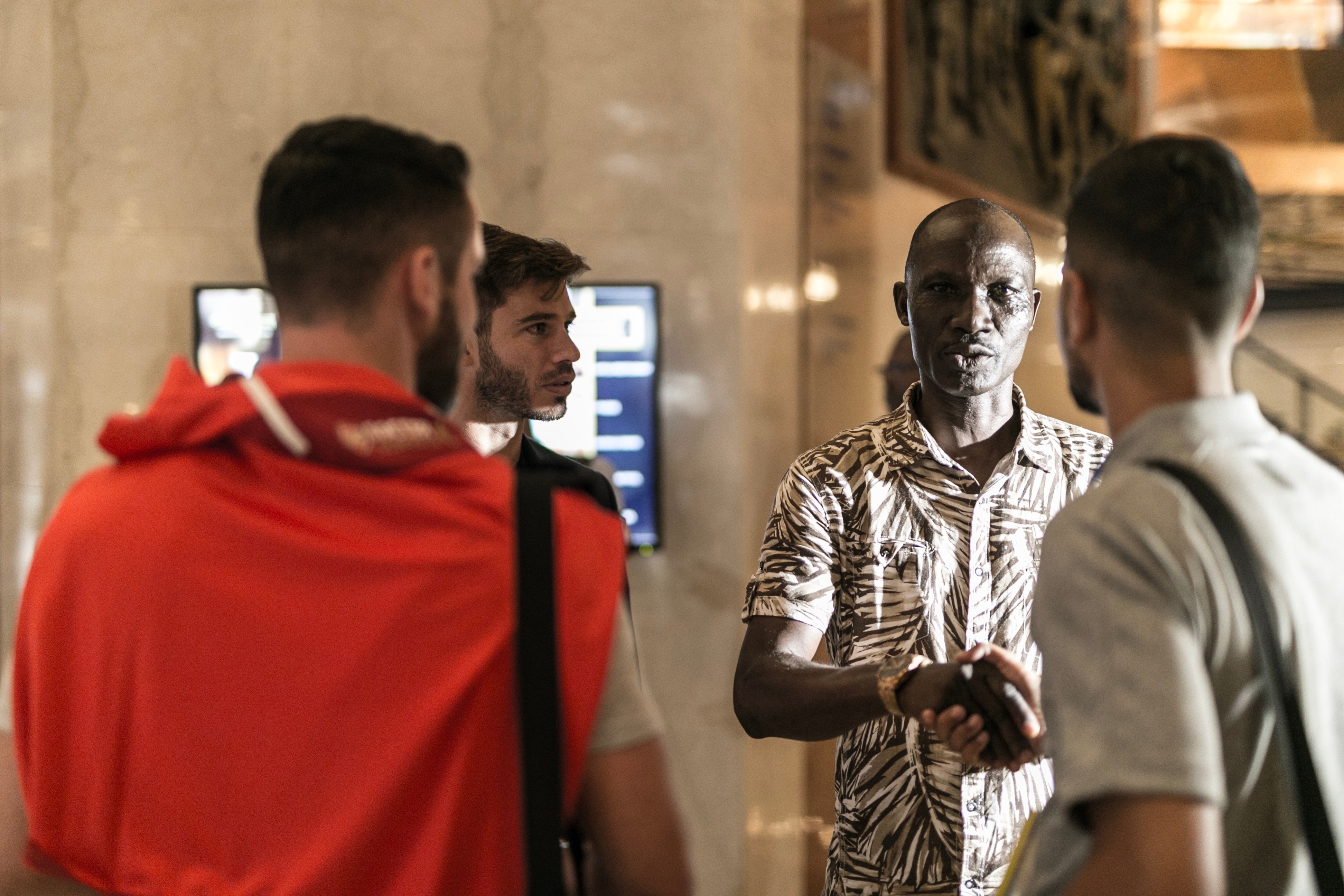 President of the Nigerian Football Coaches Association, Ladan Bosso welcoming the Arsenal team