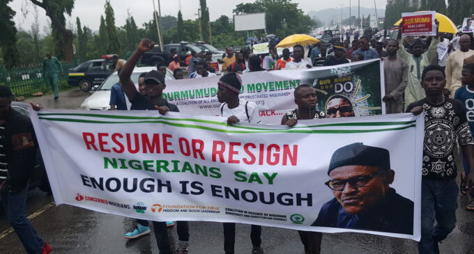 Despite downpour, protesters march to Aso Rock to demand Buhari’s resignation