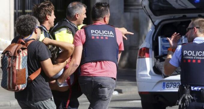 13 killed as van ploughs into crowd in Barcelona