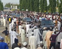 Pro-Buhari protesters block airport road