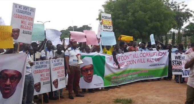 He won’t resign – Buhari’s supporters take to the streets