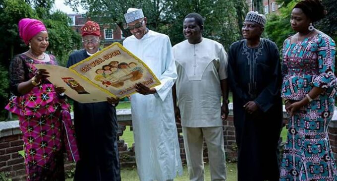 PHOTOS: Buhari laughs heartily as he hosts aides in London