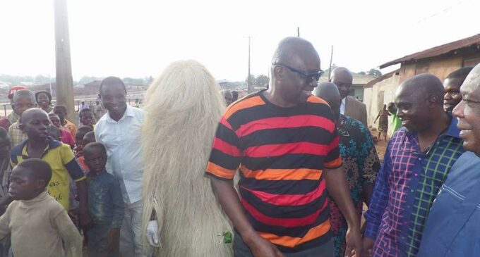 EXTRA: From pulpit to eid ground… Fayose goes traditional with masquerade