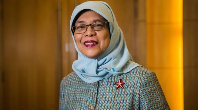 Protests as Singapore names first woman president