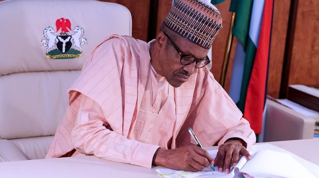 ‘Immunity for lawmakers, avoidance of double taxation’ — Buhari signs eight bills into law