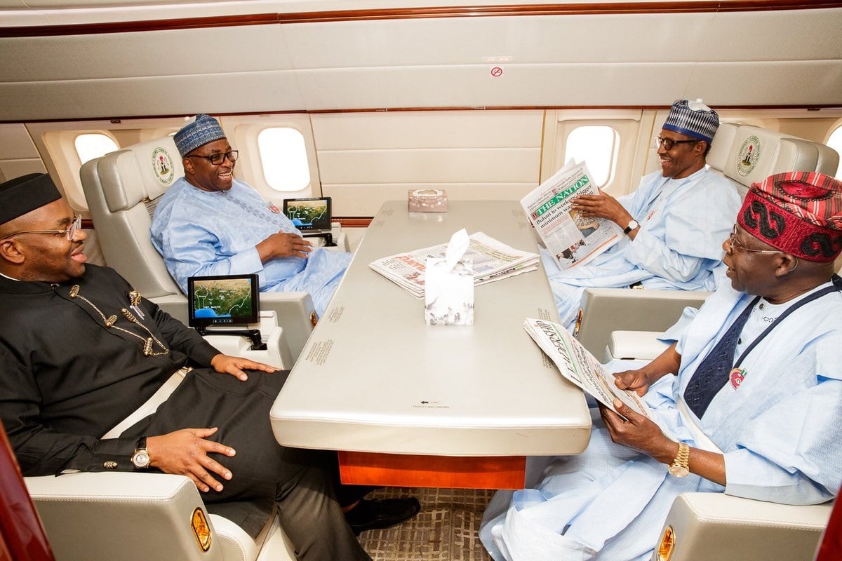 [PHOTOS] Buhari Departs To Abidjan For EU-AU summit As Tinubu Is On Board With PMB