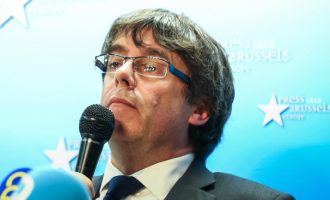 Catalan leader surrenders to police
