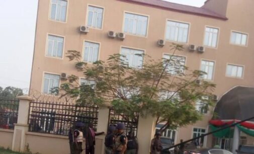 PHOTO: Armed policemen on guard at hospital treating Buhari’s son